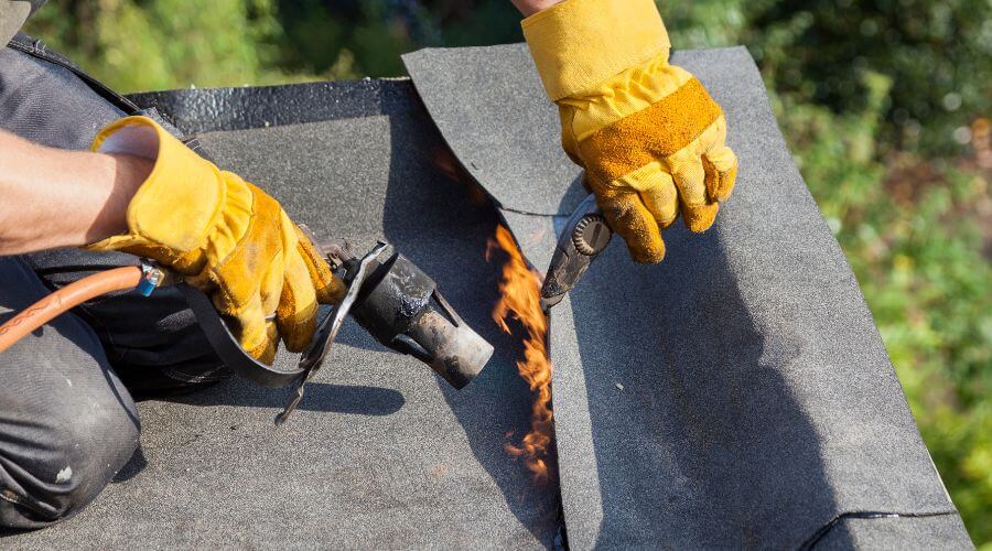 Professional gutter cleaning in White Cloud, MI